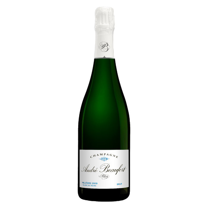 Champagne bottle, green glass with white Andre Beaufort Polisy label and foil cap