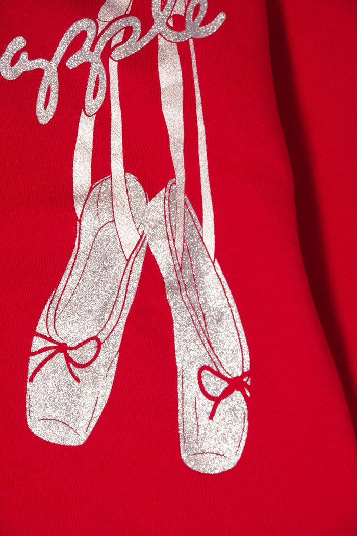 Red Christmas ballet sweater with ballet shoes and bow print in sparkly silver foil.