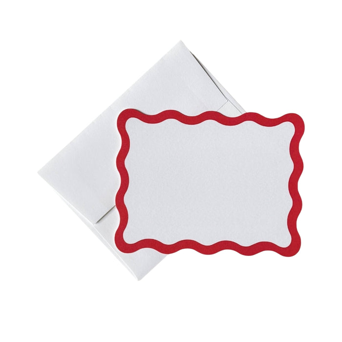 White card with red border and matching envelope on a white background