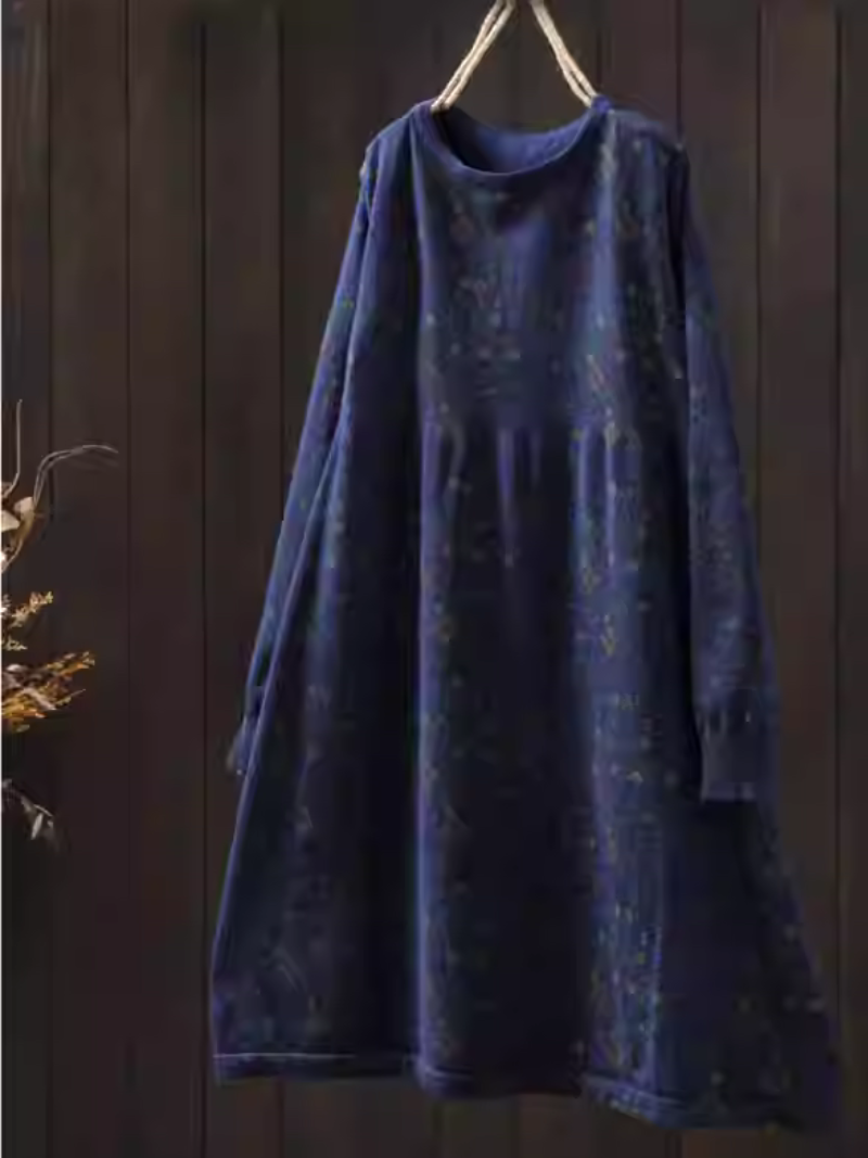 Elegant floral sweater dress in relaxed A-line silhouette for winter