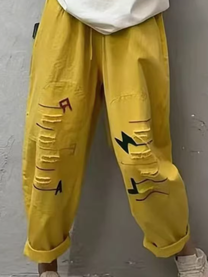 Chic Cotton Drawstring Tapered Pants with Artful Slashes for Women