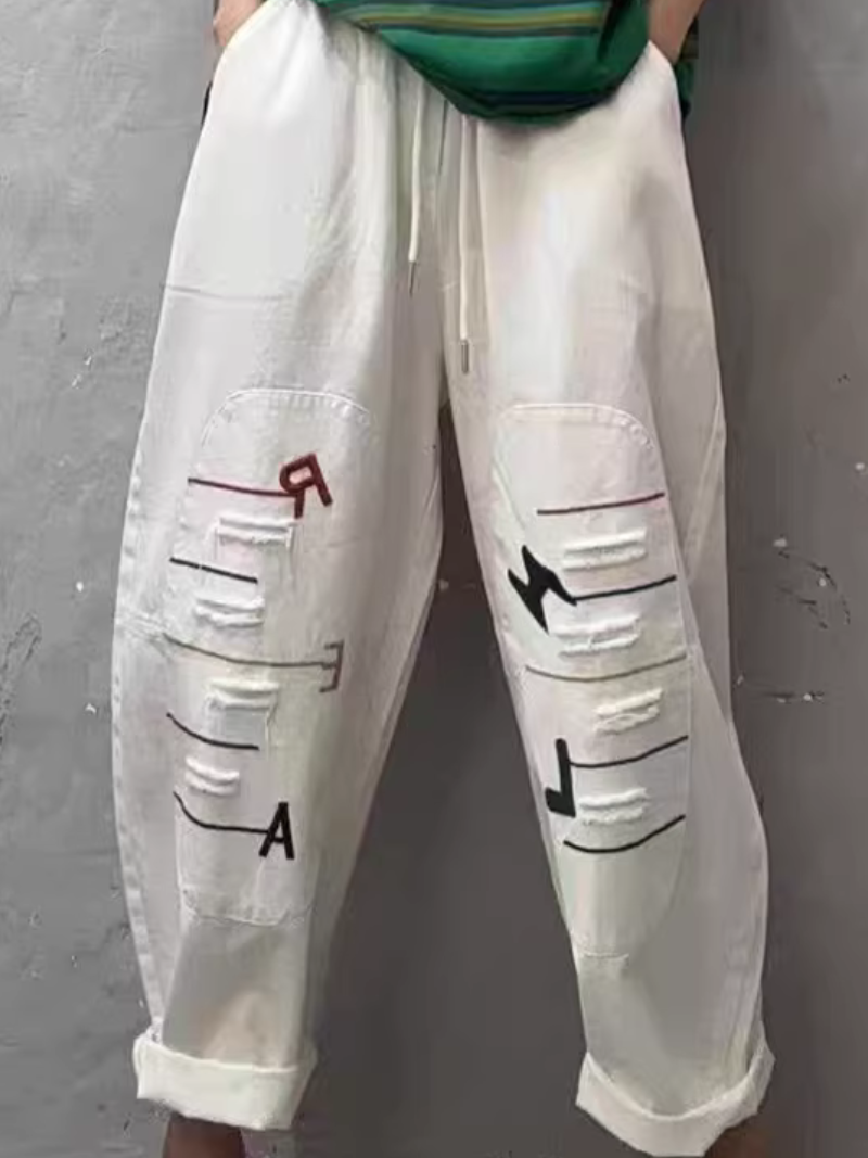 Chic Cotton Drawstring Tapered Pants with Artful Slashes for Women