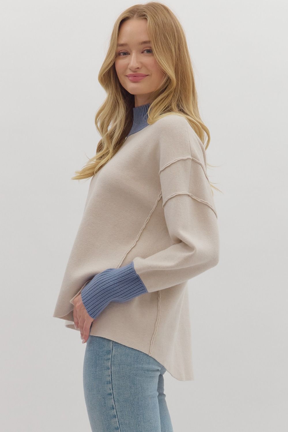 2 tone ecru/light blue sweater
