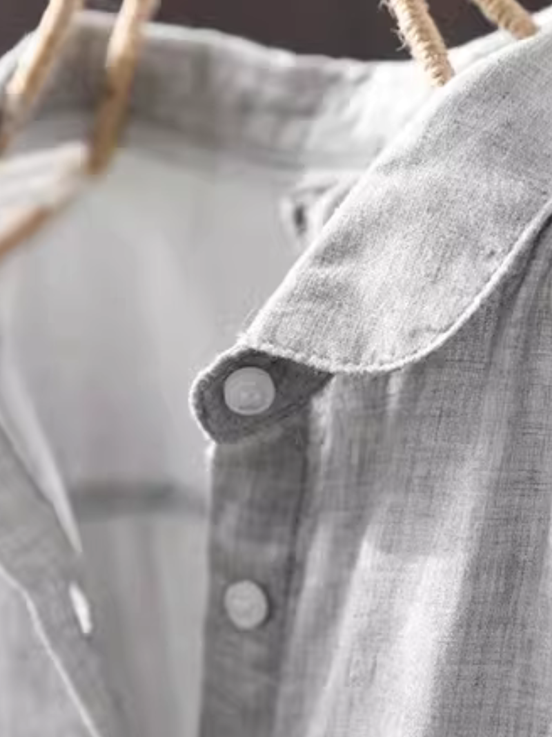 Minimalist cotton-linen button-down blouse with relaxed silhouette for elevated everyday style