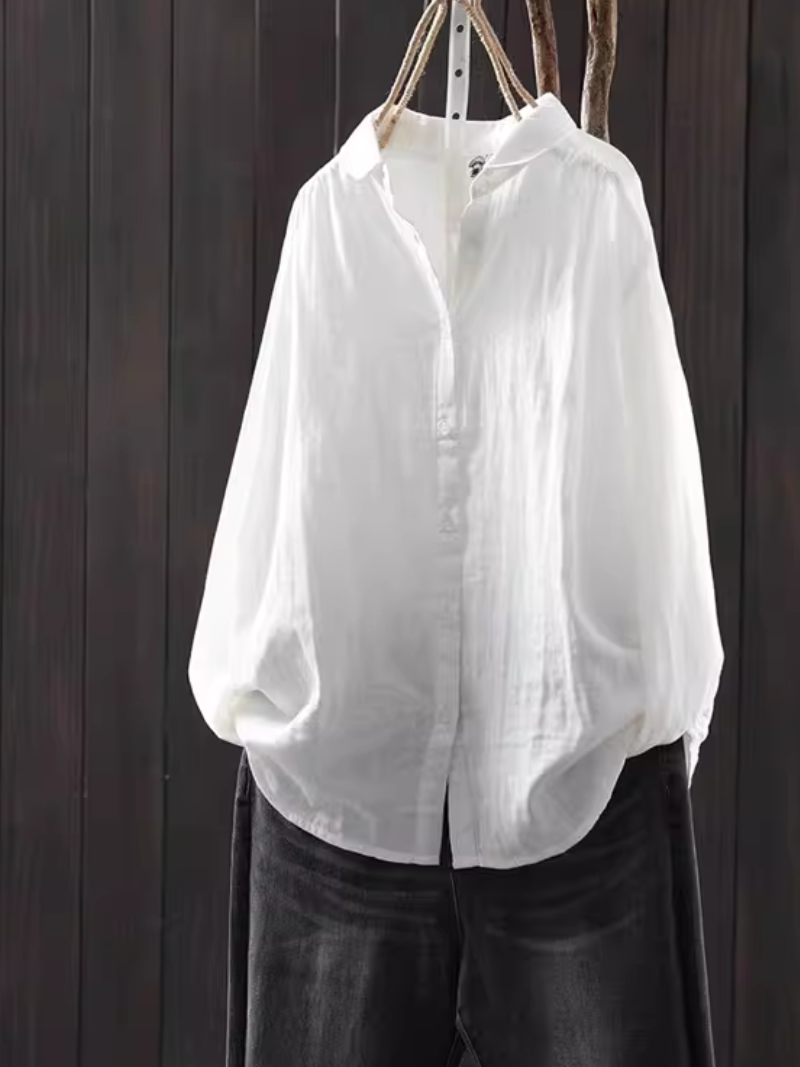 Minimalist cotton-linen button-down blouse with relaxed silhouette for elevated everyday style