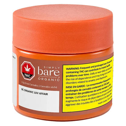 Close-up front view of the orange BC Organic Luv Affair jar with a textured lid, brown label, and prominent yellow THC warning panel.