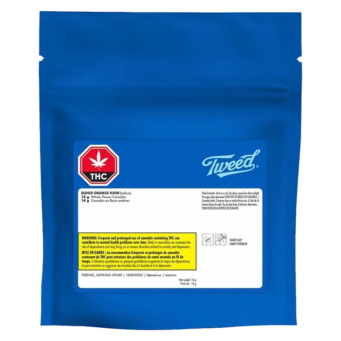 Front-facing shot of a blue resealable pouch labeled "Tweed Blood Orange Kush" with a white product label, red THC emblem, and small warning text.