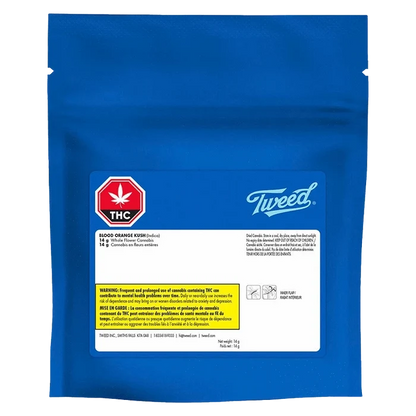 Front-facing shot of a blue resealable pouch labeled "Tweed Blood Orange Kush" with a white product label, red THC emblem, and small warning text.