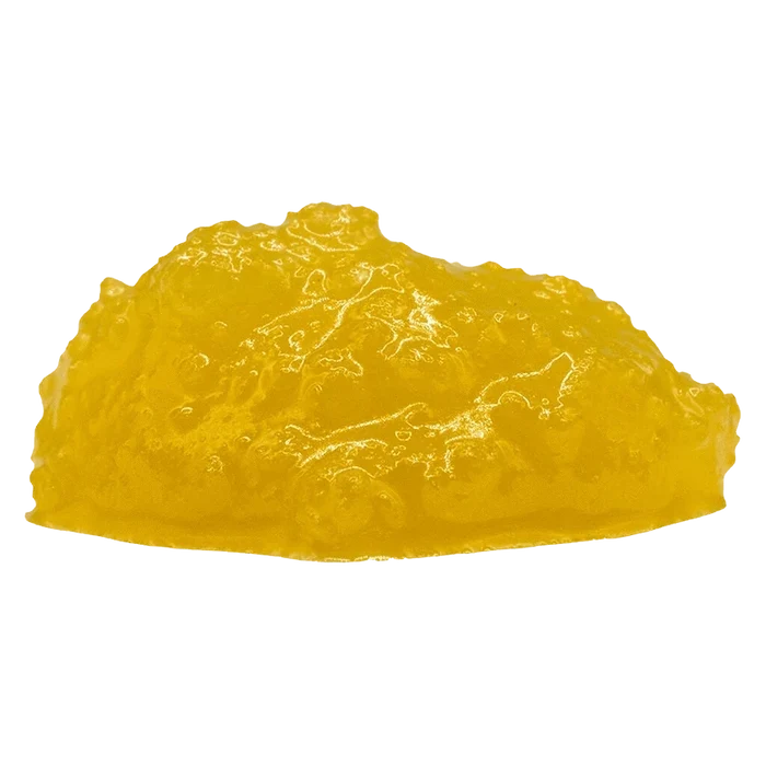 Close-up front view of a glossy yellow mound of Comatose FSE Resin against a plain background.
