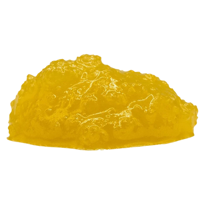 Close-up front view of a glossy yellow mound of Comatose FSE Resin against a plain background.