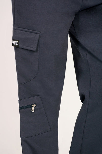 Close up shot of side pocket on dark grey combat joggers.