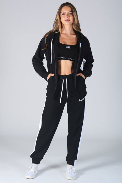 Woman wearing black Contrast Panel Joggers and matching jacket