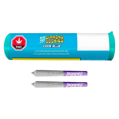 A front-facing shot of the turquoise tube and two diamond-coated pre-rolls labeled Diamond Doobies - Code Blue Infused PR 2 x 0.5 g, shown on a white background.