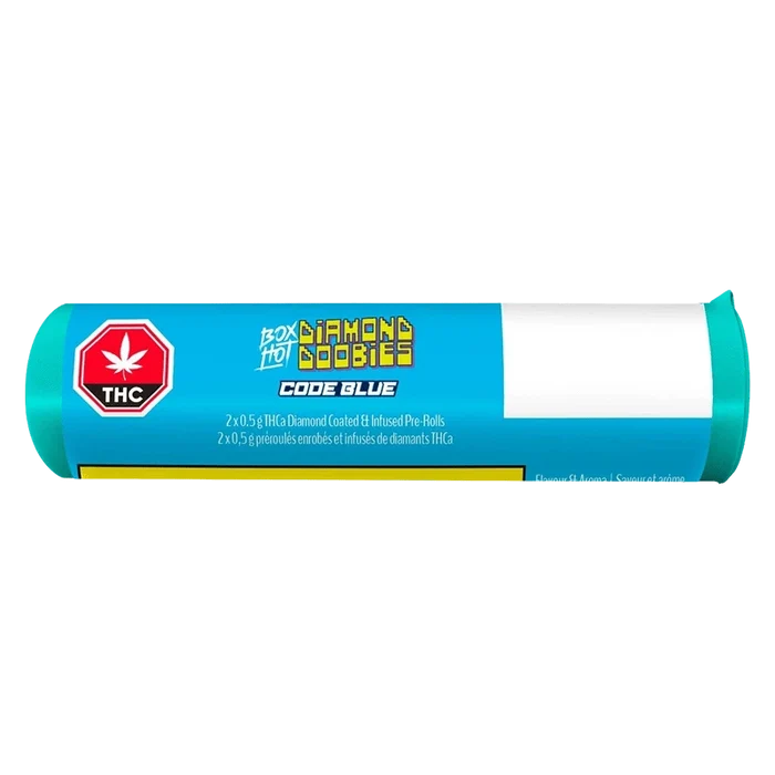 Horizontal studio shot of a bright blue tube labeled Diamond Doobies - Code Blue Infused PR 2 x 0.5 g with a red THC octagon and white blank address panel.