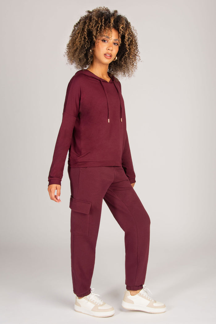 burgundy loungewear hoodie with drawstrings and light viscose fabric