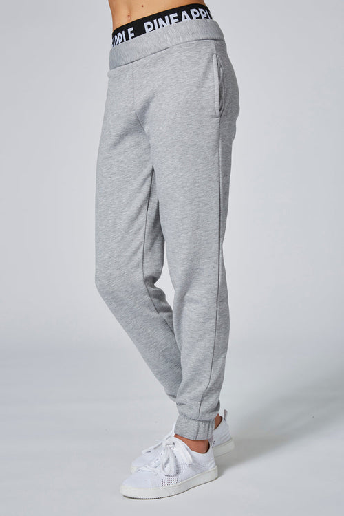 Girl wearing Pineapple Double Grey Track Pants