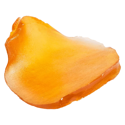 Close-up top-side view of a glossy amber slab of Fatso Jumbo Slab Shatter against a plain white background