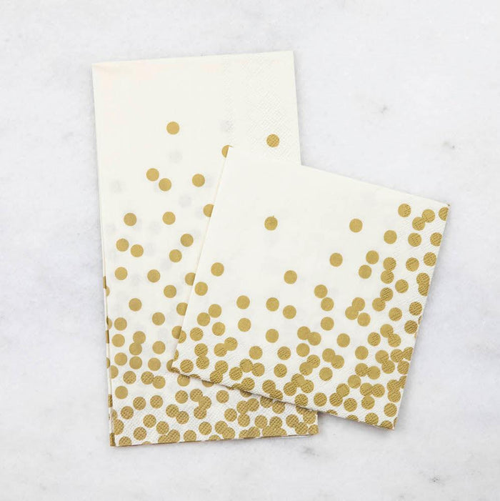 Two Gold Confetti Napkins, one Guest and one Cocktail, together on a white table.
