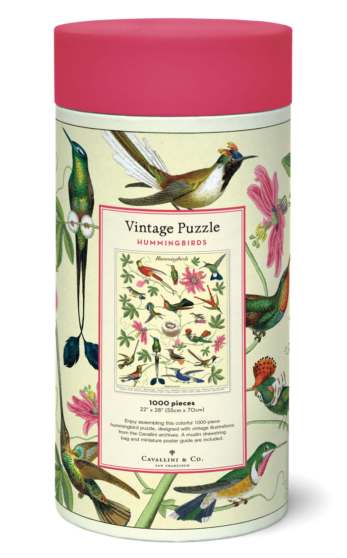 Cylindrical puzzle box with vintage hummingbird design and pink lid.