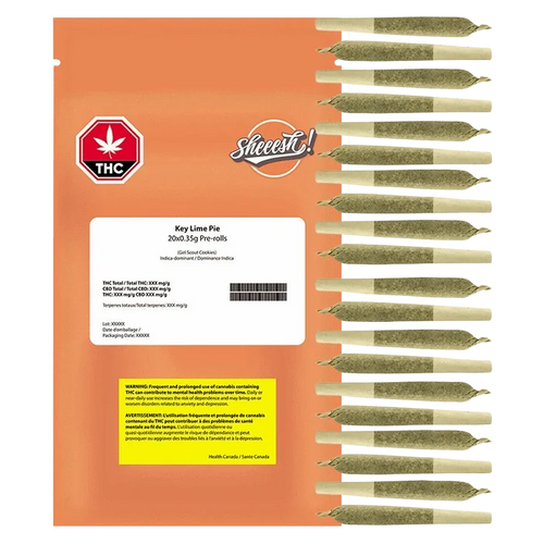 Top-down view of the orange Key Lime Pie PR 20 x 0.35 g pouch labeled "Sheeesh!" alongside a vertical row of pre-rolled joints.