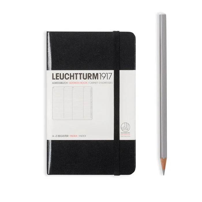 Black hardcover A6 address book, front view with elastic closure band and white LEUCHTTURM1917 belly band