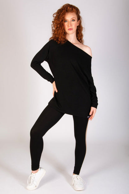 Women's longline off-shoulder sweater in black by Pineapple Dance Studios