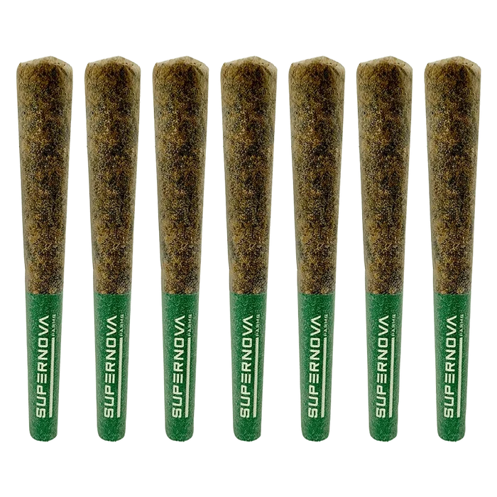 Row of seven upright Maui Wowie PR 7 x 0.5 g pre-rolls with green "SUPERNOVA" tips, evenly spaced on a neutral background.