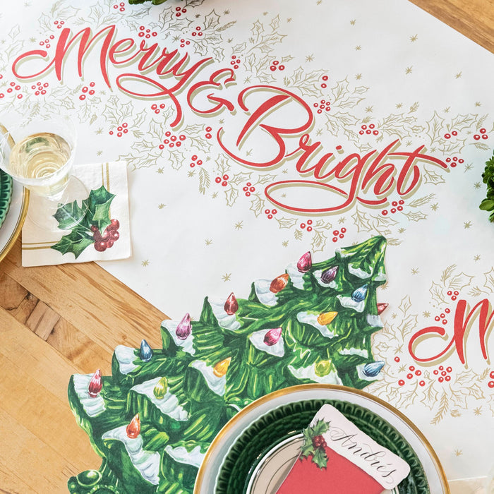 The Merry & Bright Runner under a festive Christmas-themed table setting.