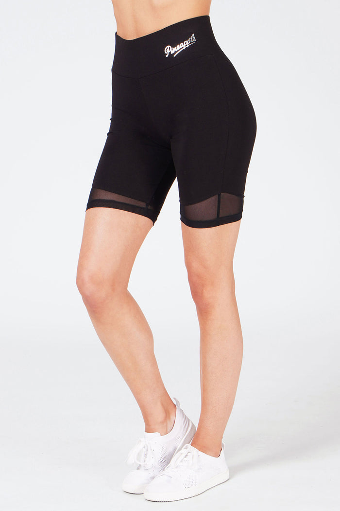 Woman wearing Pineapple Monroe Black Cycling Shorts