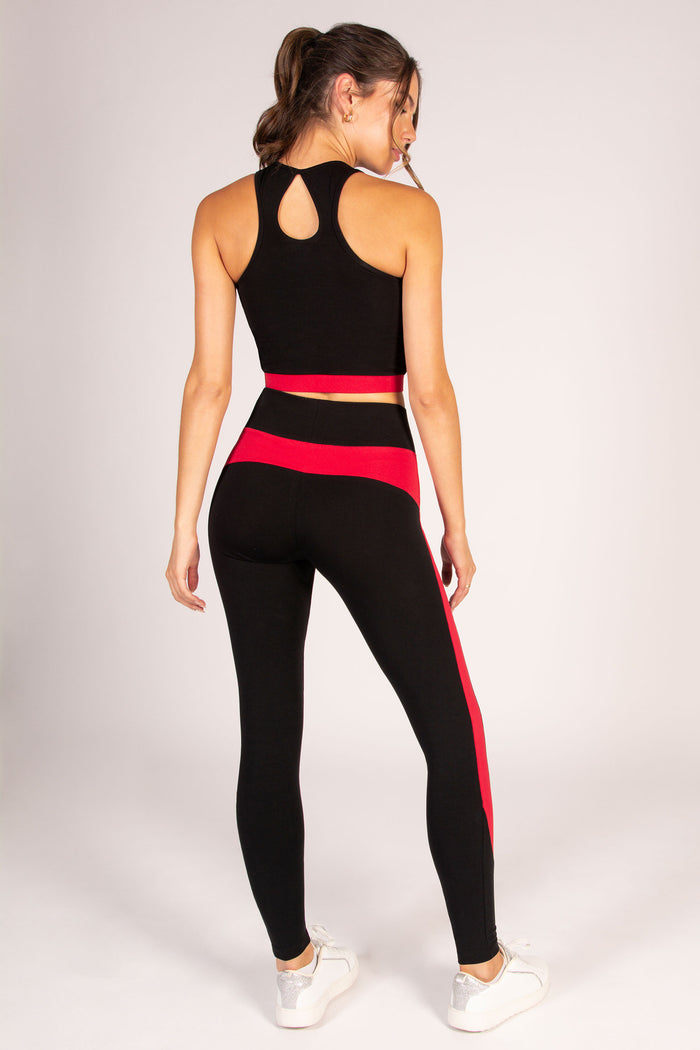 Black high neck crop top for women with open teardrop back and tight elasticated waistband.
