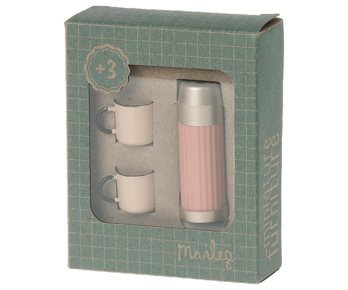 A pink Mini Thermos and Cups Set by Maileg, in a box, perfect for enjoying hot beverages or cozying up with Maileg mice.