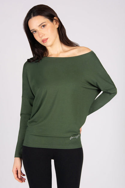 Woman wearing a khaki off-shoulder long sleeve top on a white background