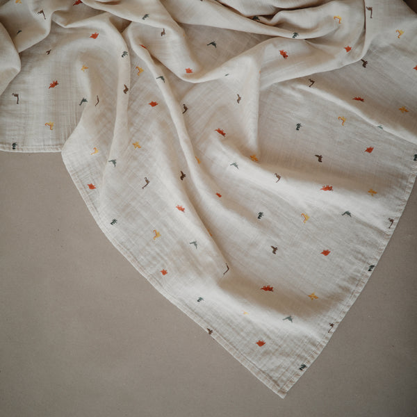 Mushie Muslin Organic Cotton Swaddle Blanket - Dinosaurs