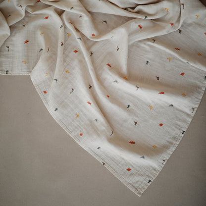 Mushie Muslin Organic Cotton Swaddle Blanket - Dinosaurs