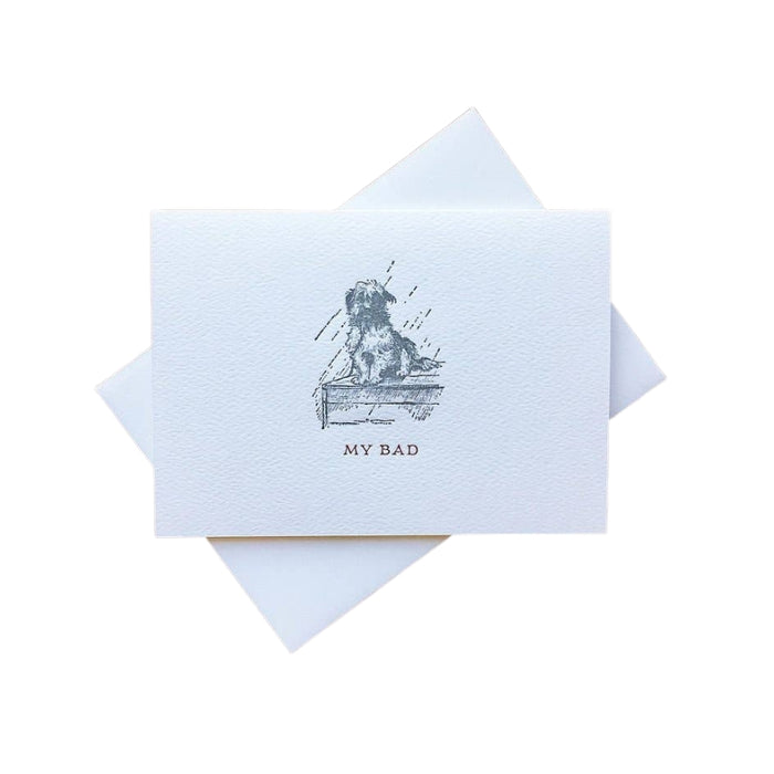 Greeting card with a dog illustration and 'My Bad' text on a white background