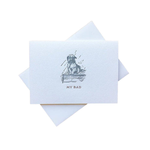 Greeting card with a dog illustration and 'My Bad' text on a white background