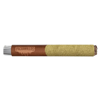 Side-on studio shot of a Packarillos Purple Zaza Infused PR 1 x 1 g blunt showing the brown branded paper and a heavy greenish kief coating on the rolled end.