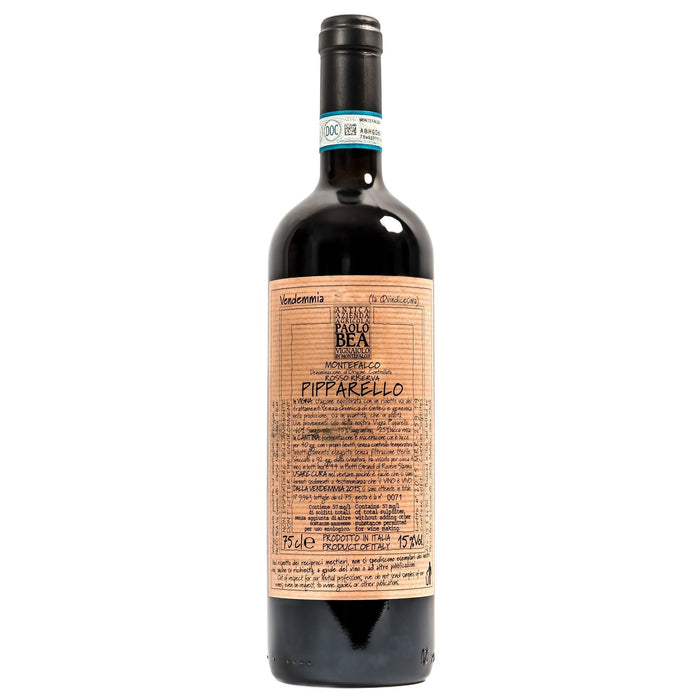 Red wine bottle with paper label and black foil cap