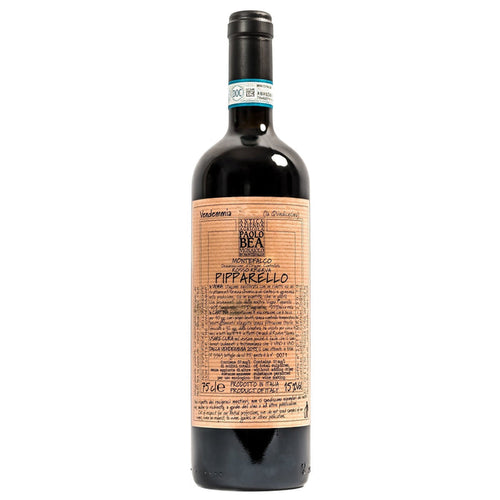 Red wine bottle with paper label and black foil cap
