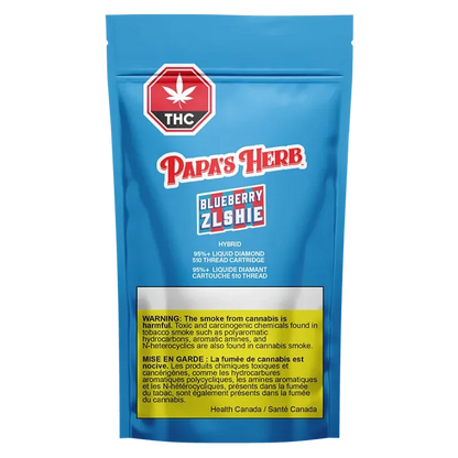 Front-facing blue foil pouch showing the Papa's Herb Blueberry Zlshie Liquid Diamond Vape Cartridge branding, THC symbol, and a yellow health warning panel.
