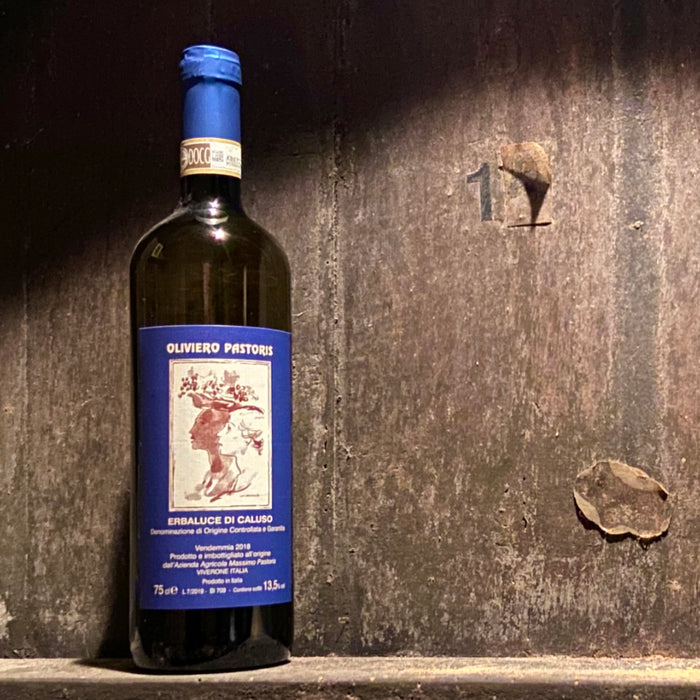 Wine bottle with dark glass and blue label, Pastoris La Norezza Erbaluce di Caluso 2021