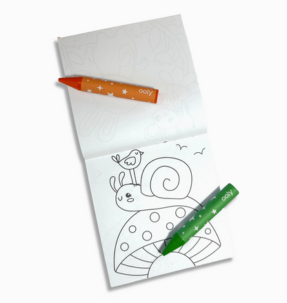 Coloring book with a snail illustration and two crayons on a white background