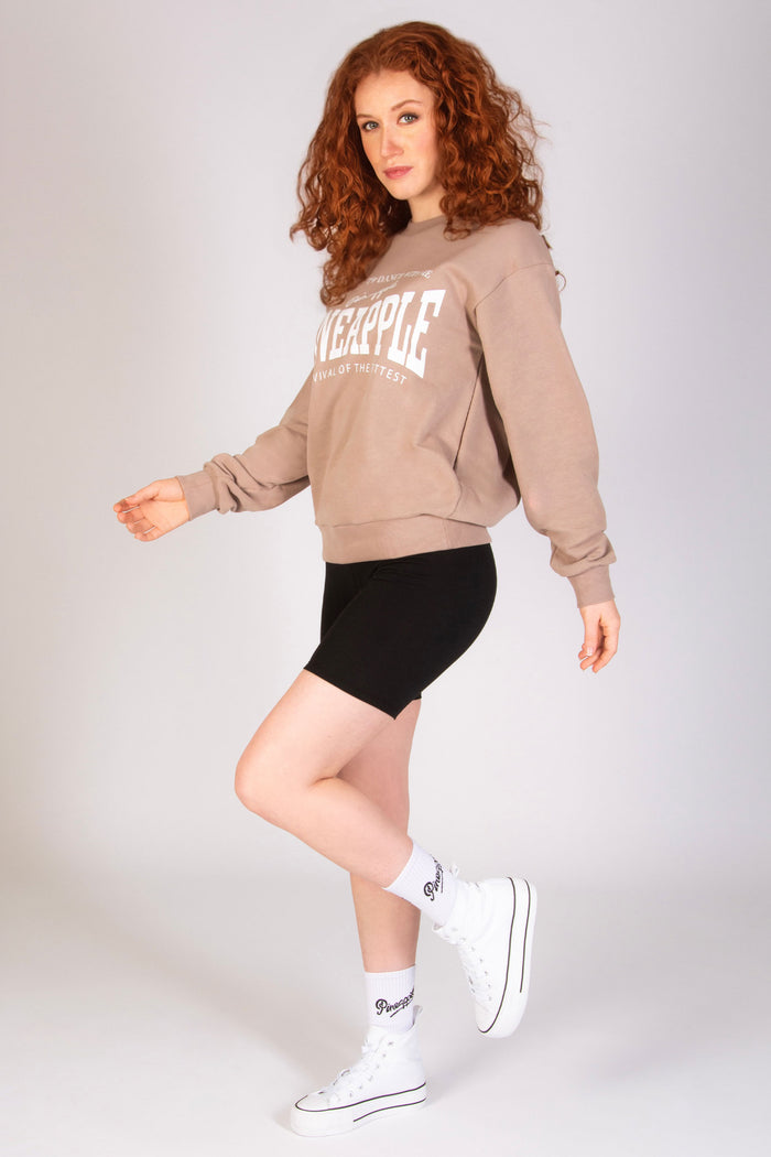 Women's Pineapple dance look featuring oversized mocha sweatshirt and cycling shorts.