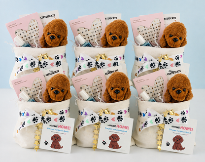Six small plush dog gift baskets arranged in a grid on a white surface against a pale blue background. Each basket contains a brown stuffed dog face, a cream fabric bag, a white ribbon printed with black paw prints, gold foil stars, a pink certificate card, and a small 'Get Him Home!' gift tag.