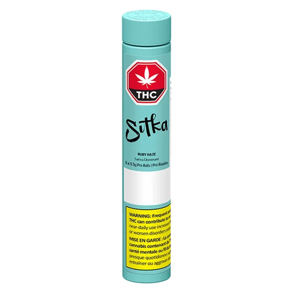 Tall front-facing turquoise tube labeled "Ruby Haze PR 5 x 0.5 g" with a red THC stop-sign logo and a yellow warning panel at the bottom.