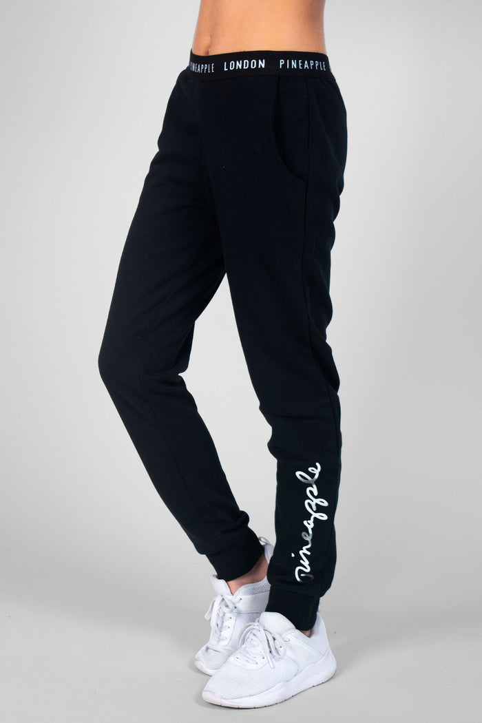 Girl wearing Pineapple black Script Joggers