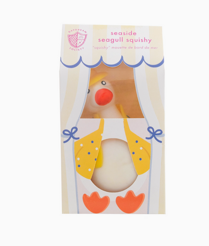 Packaged seagull squishy toy with a white background