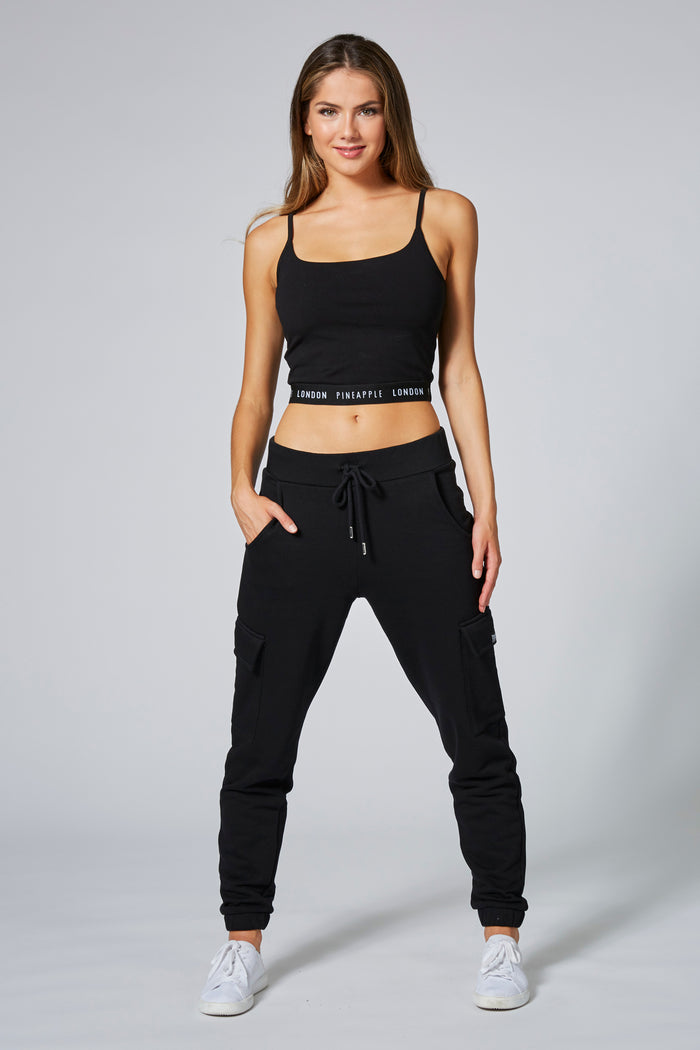 Woman wearing Black Strappy Midi Crop