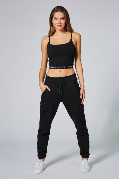 Woman wearing Black Strappy Midi Crop
