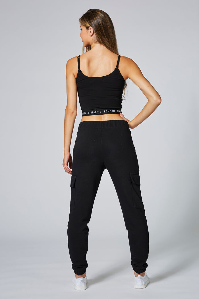 Woman wearing Black Strappy Midi Crop